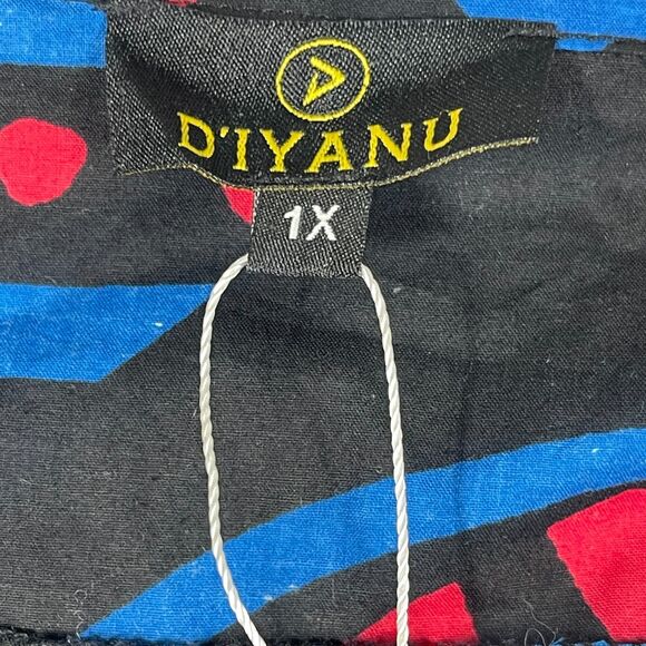 Vibrant Geometric Jumpsuit in Blue and Red - Picture 9 of 16